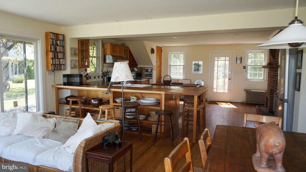 5439 Cassons Neck Road Cambridge, MD 21613 - Photo 12 of 30 Living Room into Kitchen