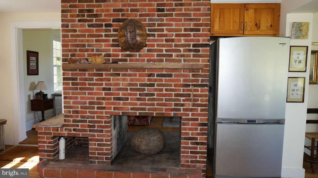 5439 Cassons Neck Road Cambridge, MD 21613 - Photo 14 of 30 Kitchen Fireplace