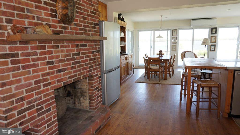 5439 Cassons Neck Road Cambridge, MD 21613 - Photo 15 of 30 Kitchen into Dining Area