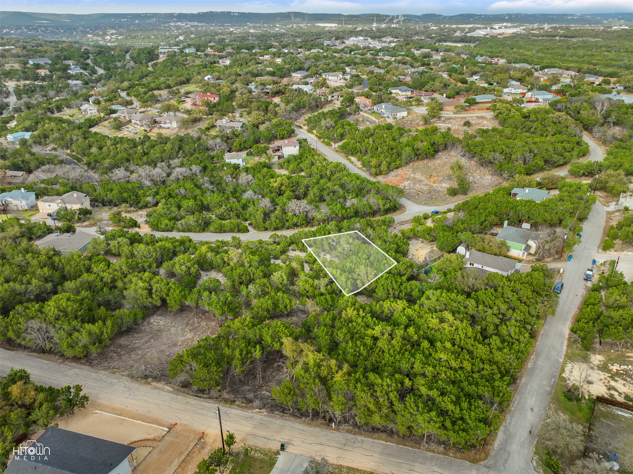 20705 Oak Ridge Lago Vista, TX 78645 - Photo 10 of 11 an aerial view of residential houses with outdoor space and trees