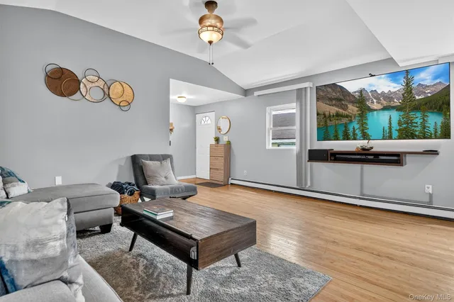 a living room with furniture and a window