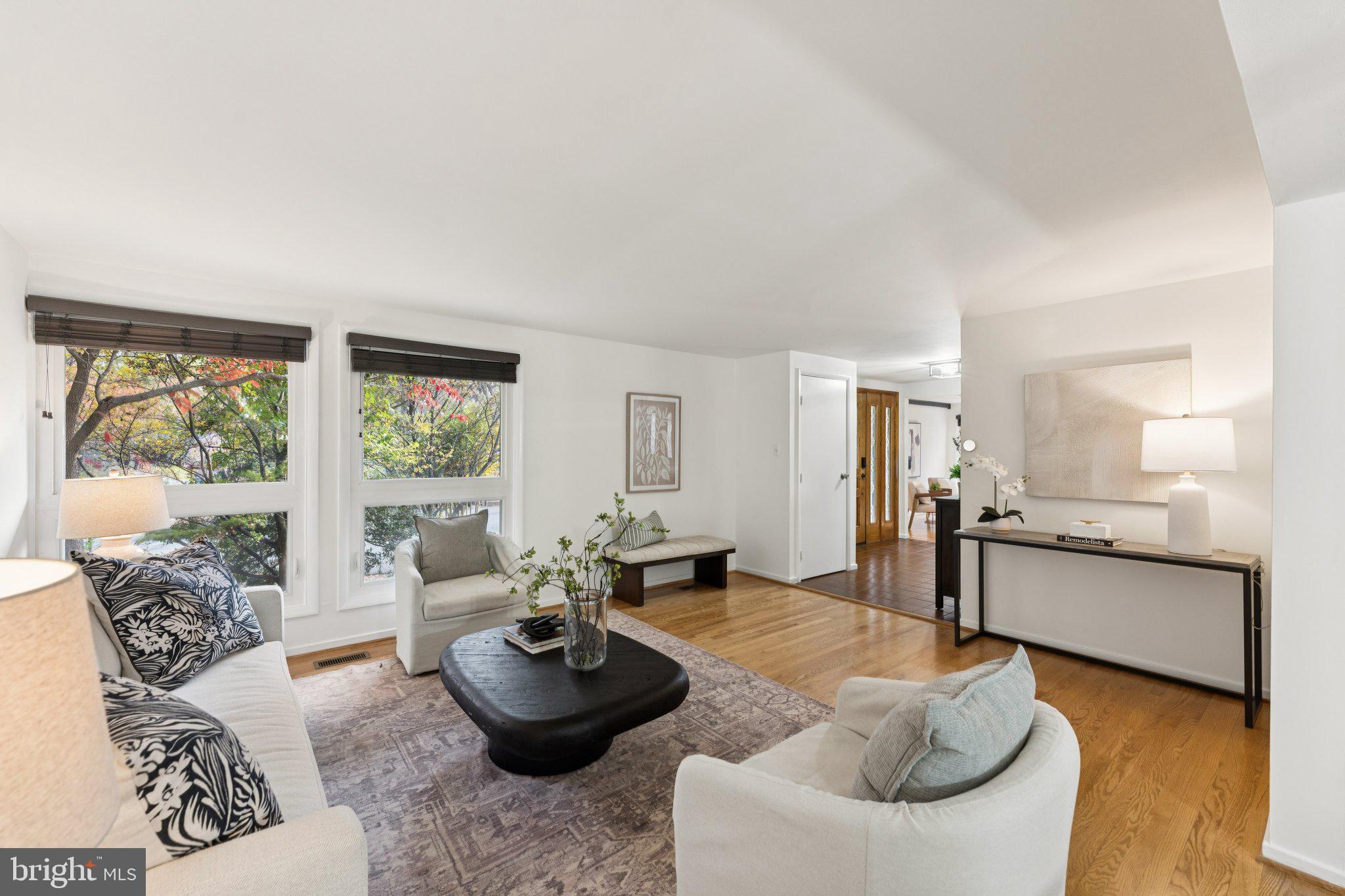 11234 Hunting Horn Lane Reston, VA 20191 - Photo 16 of 44 a living room with furniture and a large window