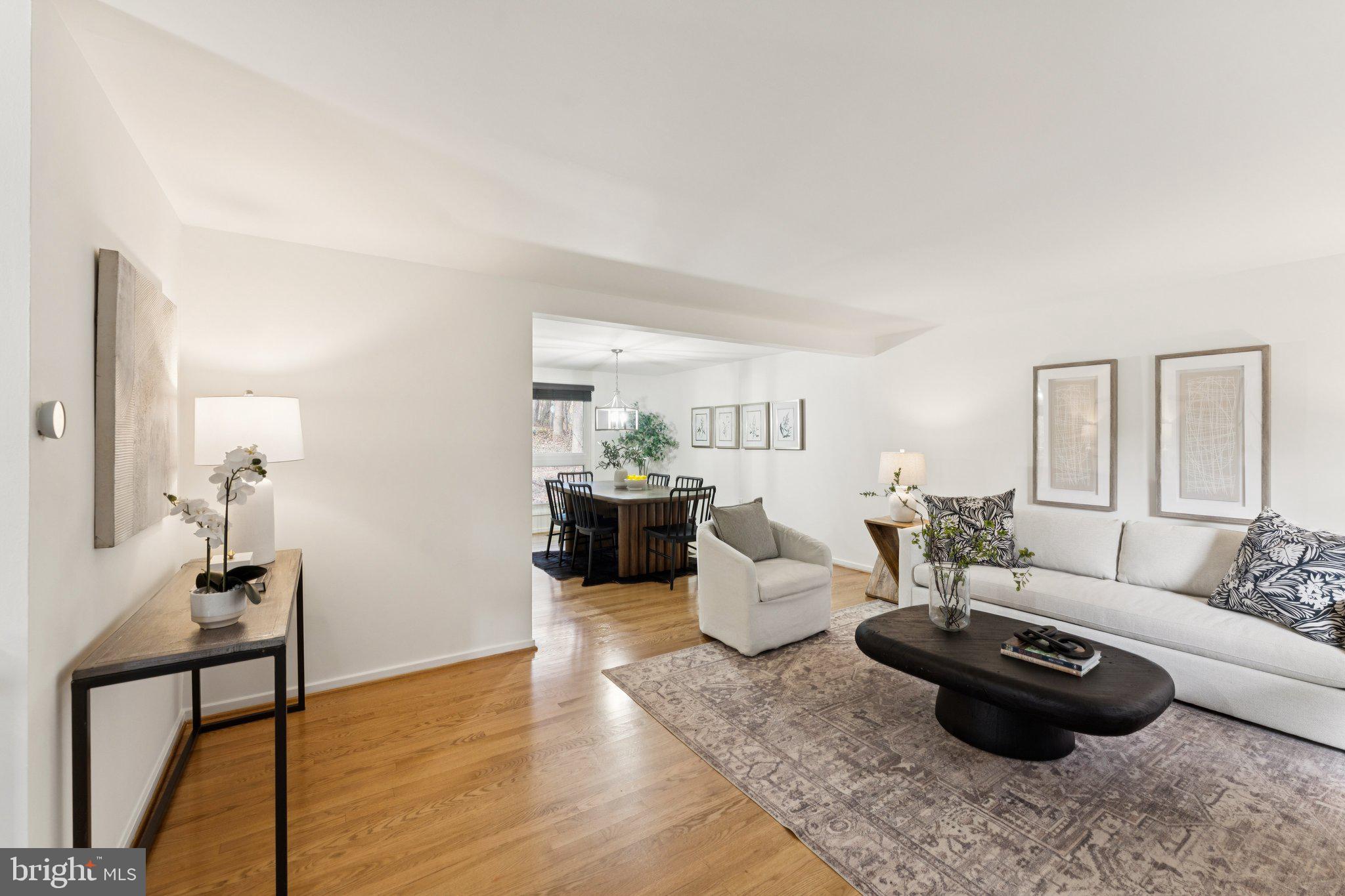11234 Hunting Horn Lane Reston, VA 20191 - Photo 19 of 44 a living room with furniture and a wooden floor