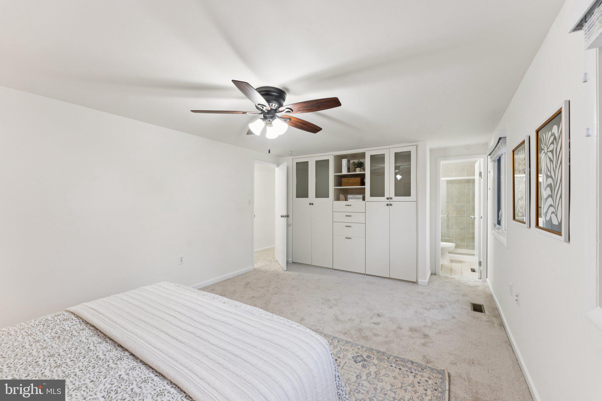 11234 Hunting Horn Lane Reston, VA 20191 - Photo 25 of 44 a view of a bedroom with a workspace