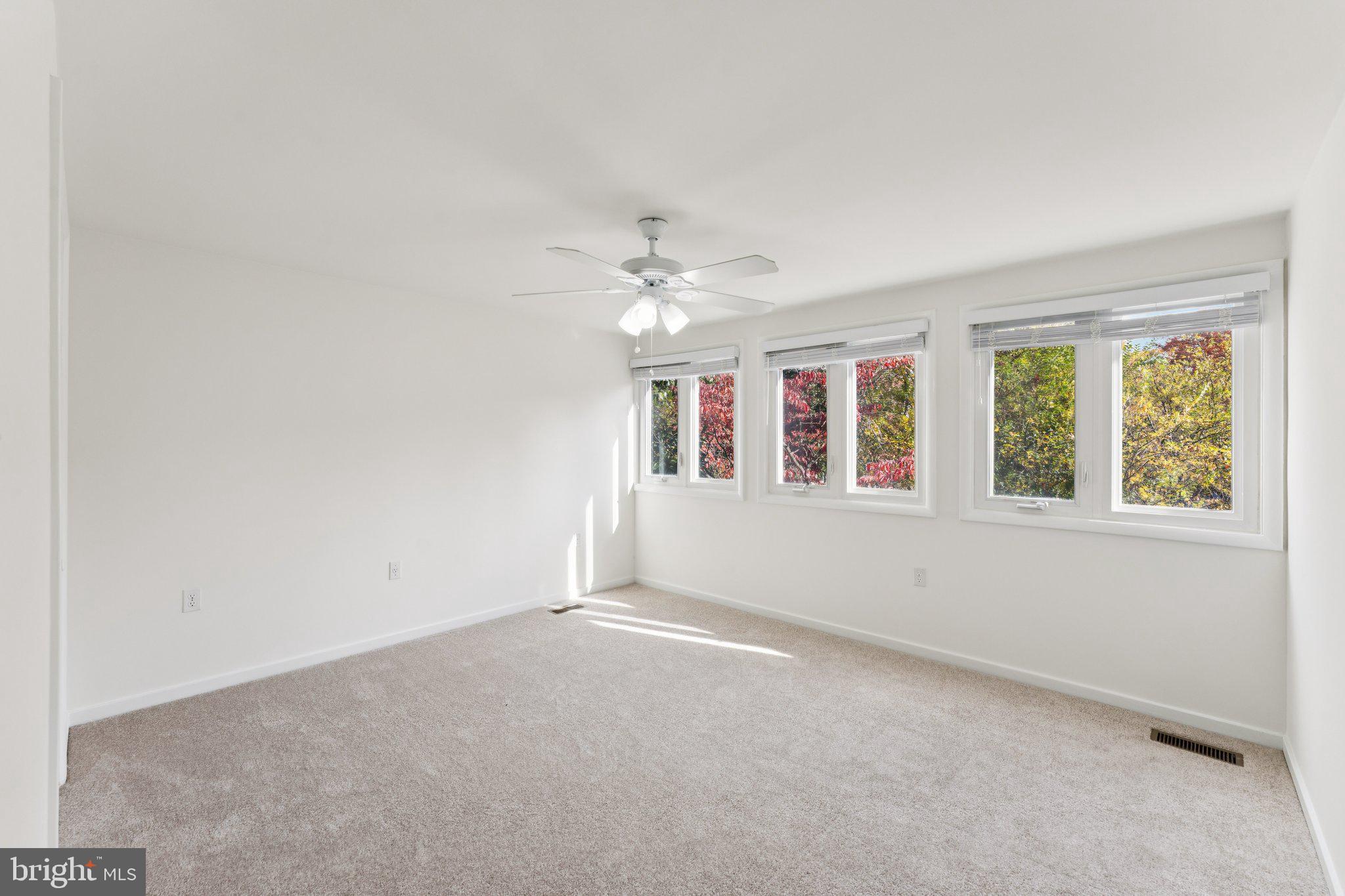 11234 Hunting Horn Lane Reston, VA 20191 - Photo 30 of 44 a view of an empty room with a window