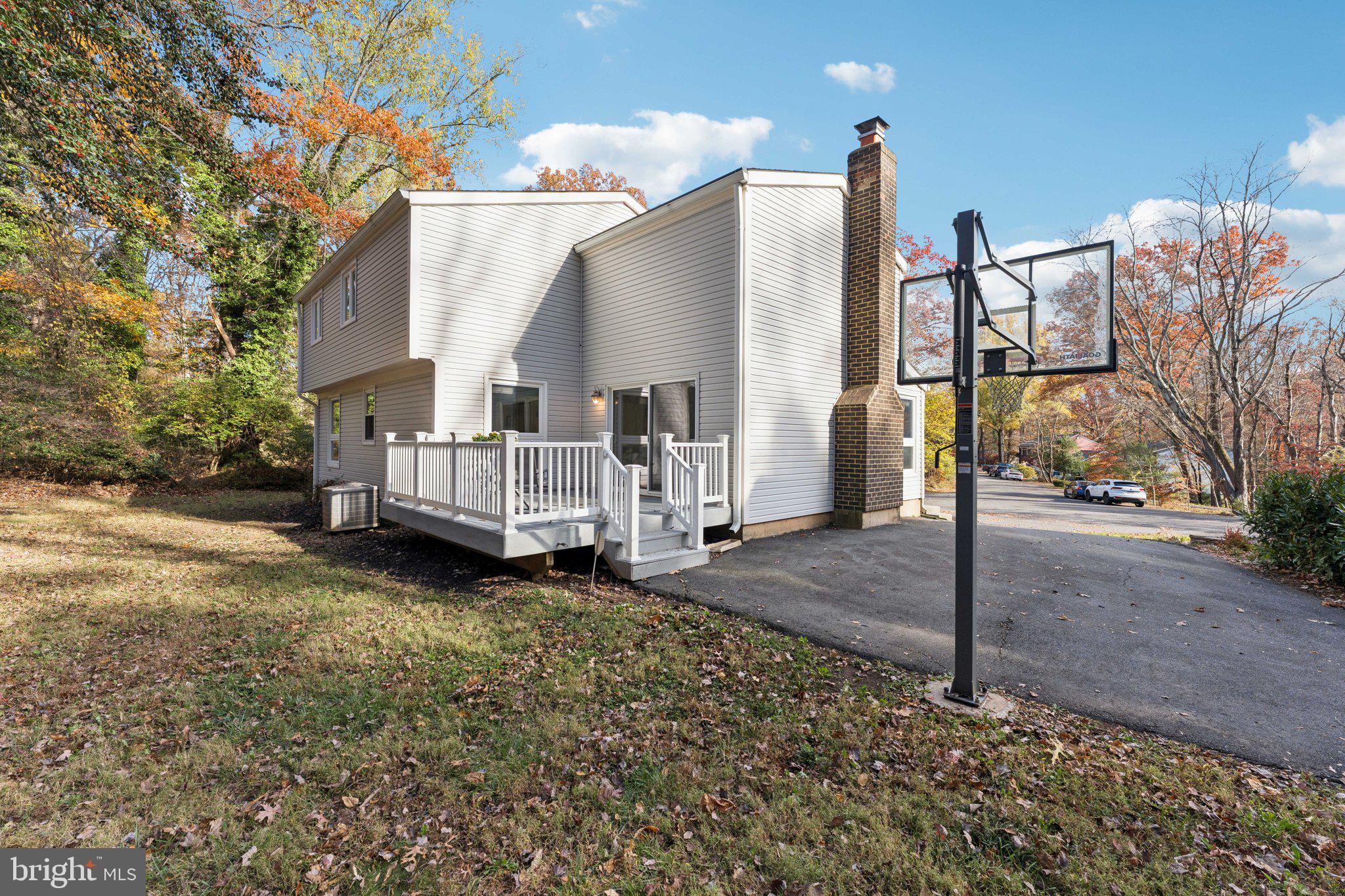 11234 Hunting Horn Lane Reston, VA 20191 - Photo 36 of 44 a view of a house with a yard