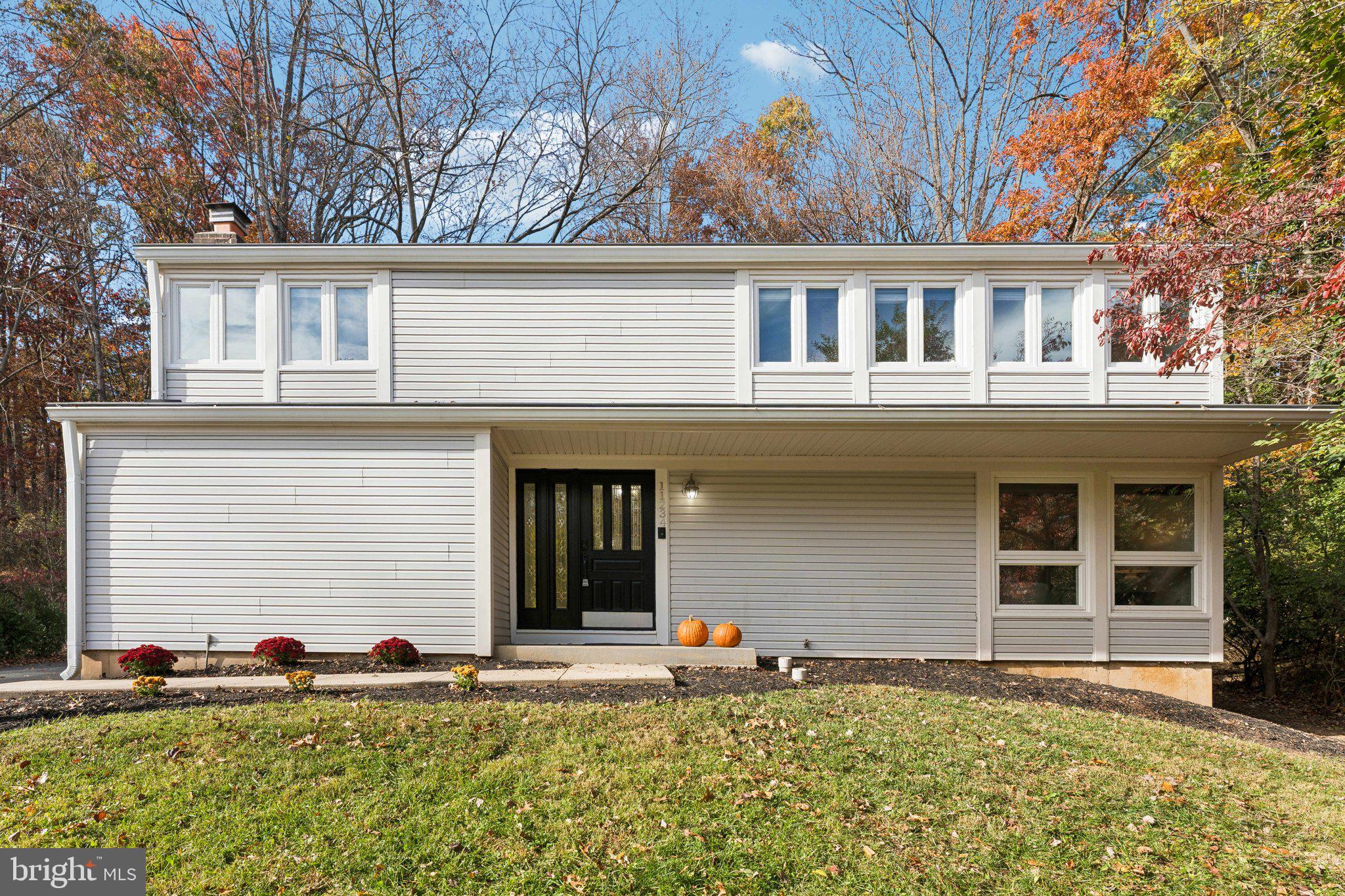 11234 Hunting Horn Lane Reston, VA 20191 - Photo 43 of 44 a house view with a outdoor space