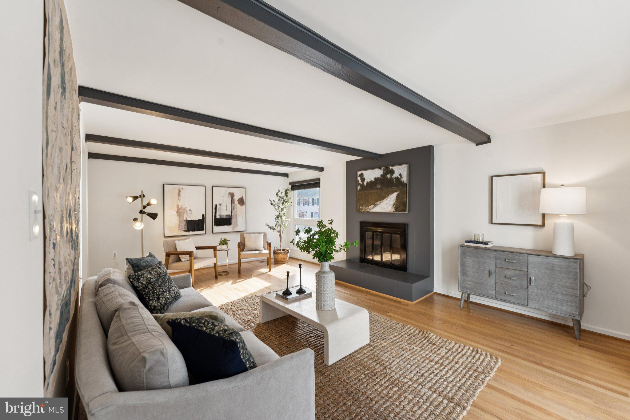 11234 Hunting Horn Lane Reston, VA 20191 - Photo 7 of 44 a living room with furniture and a fireplace