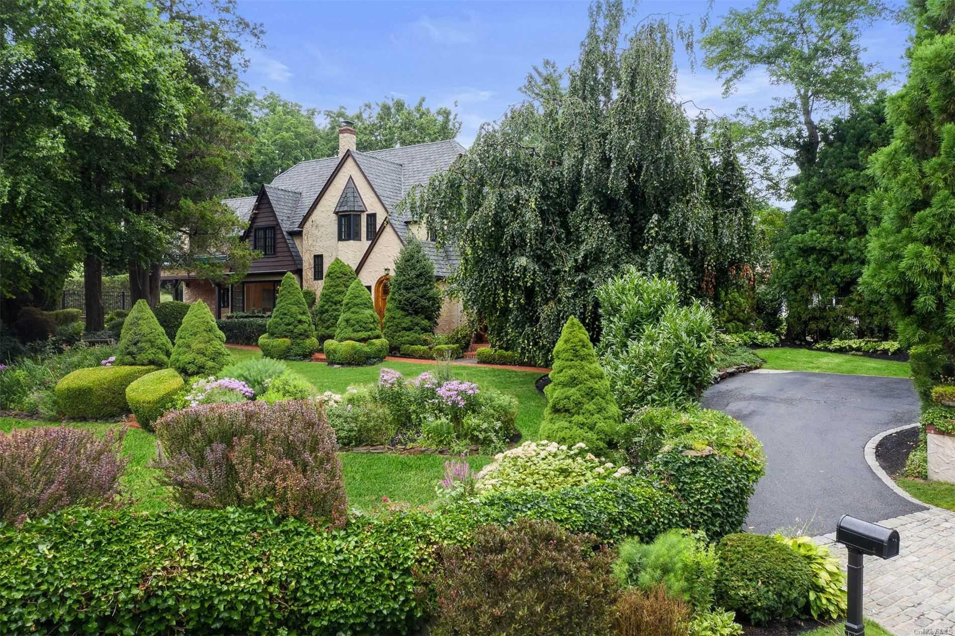 2 Prospect Road Centerport, NY 11721 - Photo 1 of 1 a aerial view of a house with yard and green space
