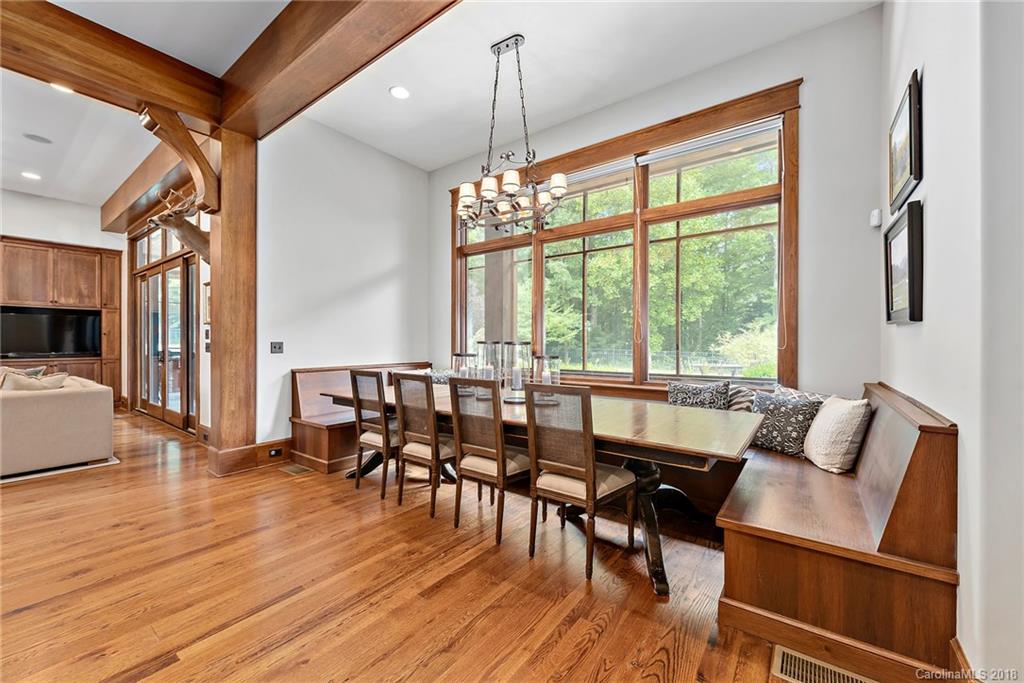 10900 Unity Church Road Mooresville, NC 28115 - Photo 12 of 31 a view of a dining room with furniture window and wooden floor