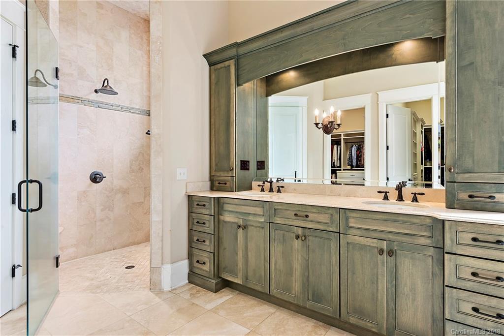 10900 Unity Church Road Mooresville, NC 28115 - Photo 16 of 31 a spacious bathroom with a double vanity sink mirror and double