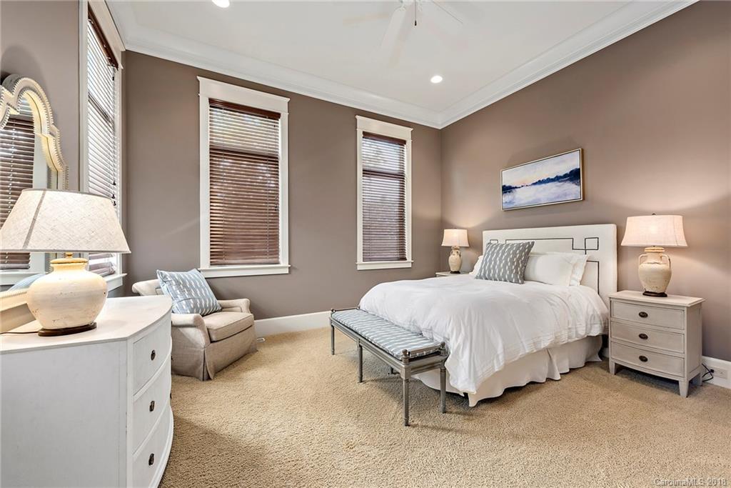10900 Unity Church Road Mooresville, NC 28115 - Photo 18 of 31 a bedroom with a bed and a couch