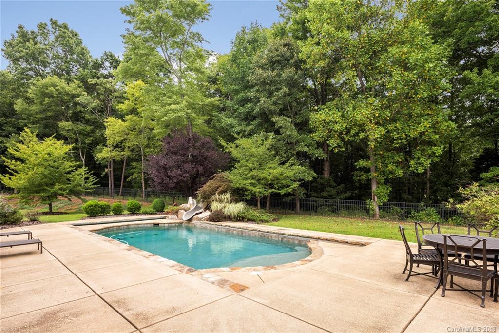 10900 Unity Church Road Mooresville, NC 28115 - Photo 24 of 31 a view of a swimming pool with a patio