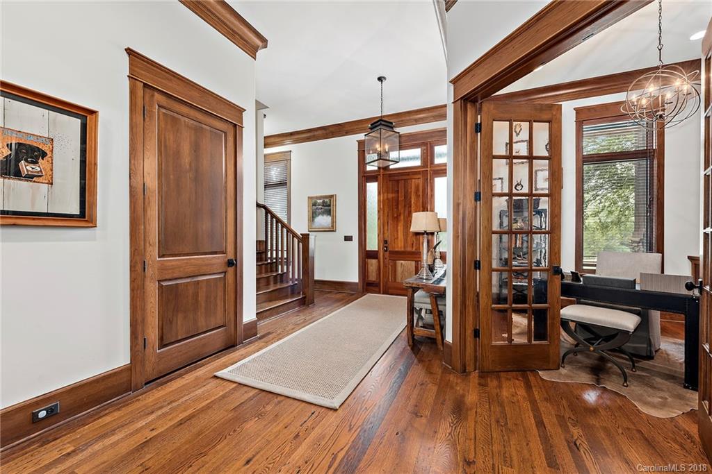 10900 Unity Church Road Mooresville, NC 28115 - Photo 5 of 31 a living room with furniture a large window and wooden floor