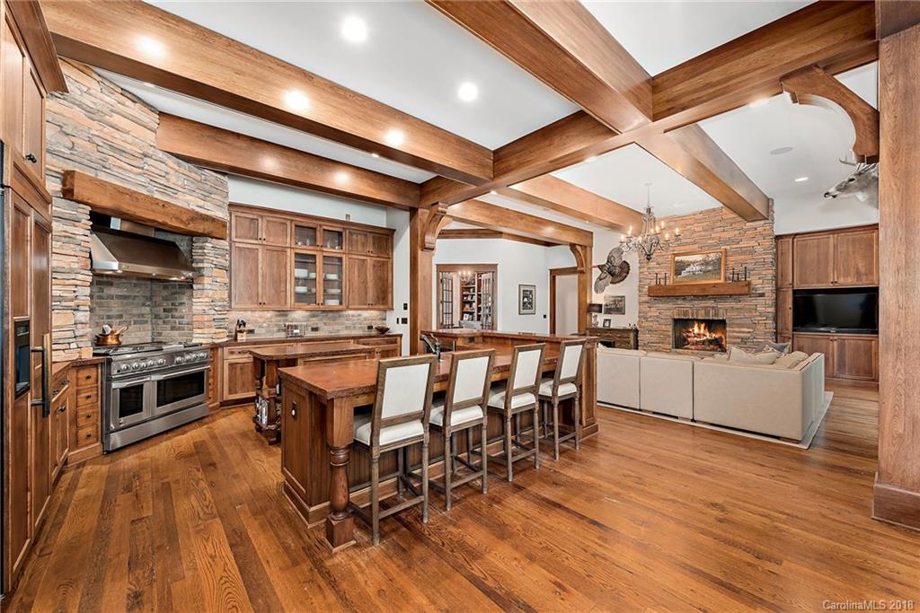 10900 Unity Church Road Mooresville, NC 28115 - Photo 9 of 31 a large kitchen with a table and chairs in it