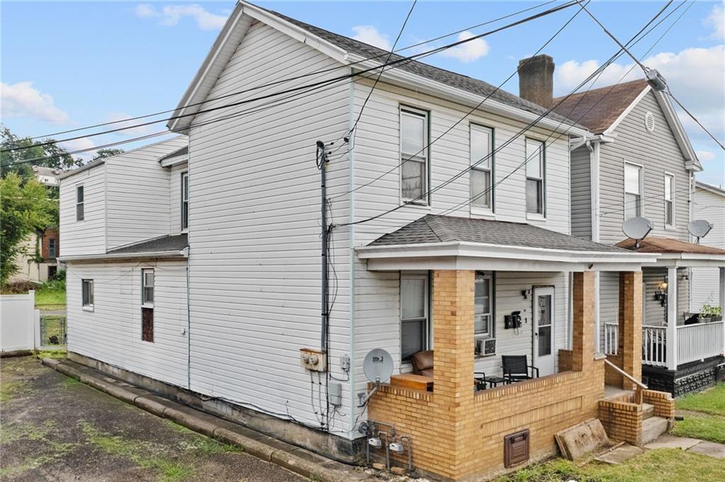 107 Dickman Street Carnegie, PA 15106 - Photo 2 of 47 a front view of a house with a yard