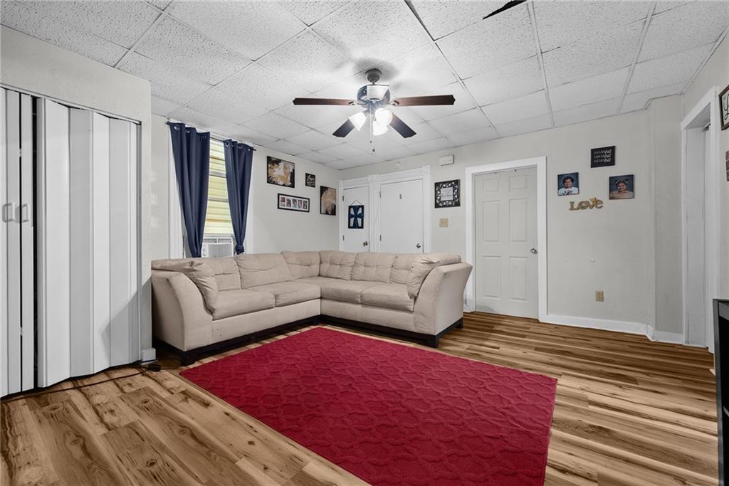 107 Dickman Street Carnegie, PA 15106 - Photo 23 of 47 a living room with furniture and a rug