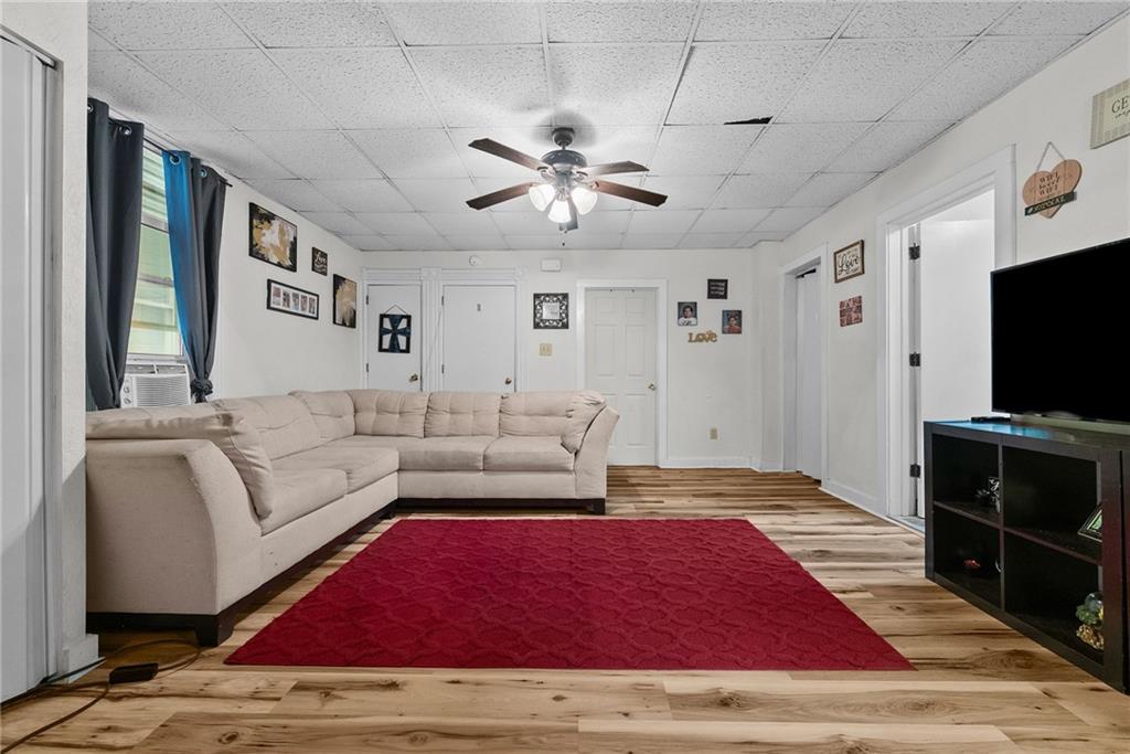 107 Dickman Street Carnegie, PA 15106 - Photo 24 of 47 a living room with furniture and a flat screen tv