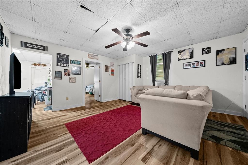 107 Dickman Street Carnegie, PA 15106 - Photo 25 of 47 a living room with furniture and a flat screen tv
