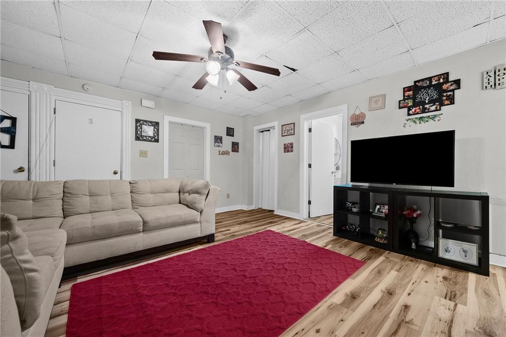 107 Dickman Street Carnegie, PA 15106 - Photo 26 of 47 a living room with furniture and a flat screen tv