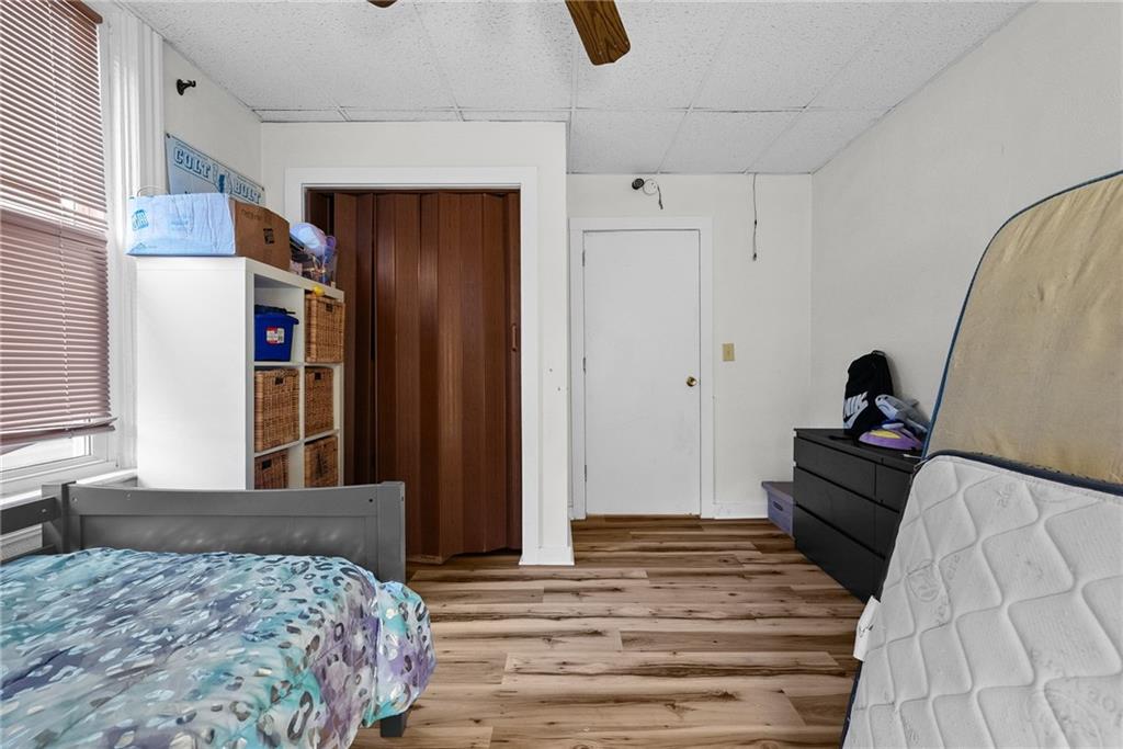 107 Dickman Street Carnegie, PA 15106 - Photo 36 of 47 a bedroom with a bed and a dresser