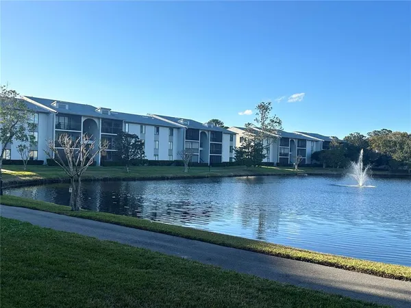 a view of a lake with a house