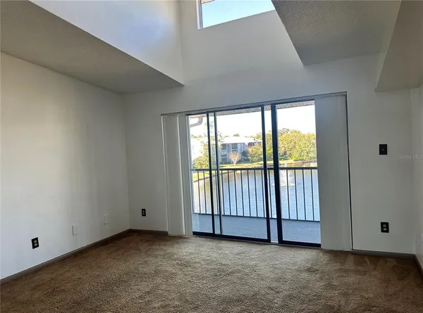 an empty room with sliding door