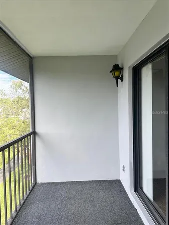 a view of a room with a window