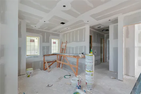 a view of a hallway with seating area