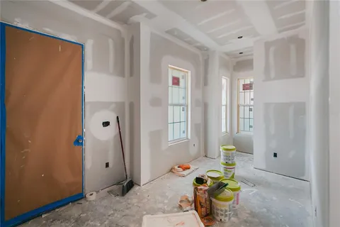 a room with furniture and window