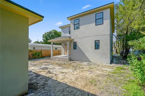 a house with trees in front of it