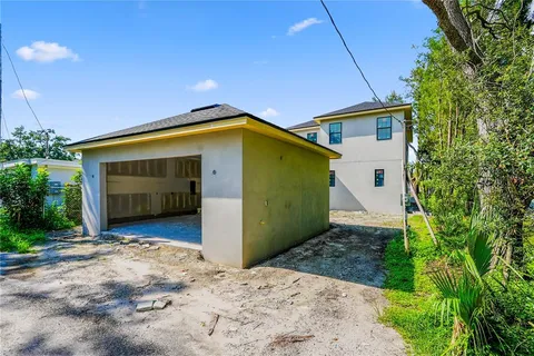 a front view of a house having yard