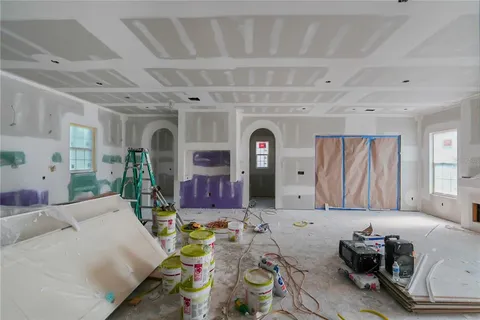 a living room with furniture and window