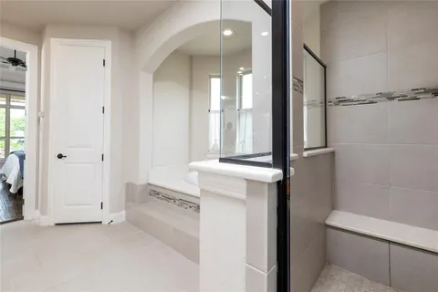 a bathroom with a sink and mirror