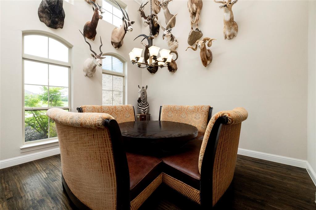 1413 Artesia Lane McLendon-Chisholm, TX 75032 - Photo 4 of 40 a dining room with furniture and wooden floor