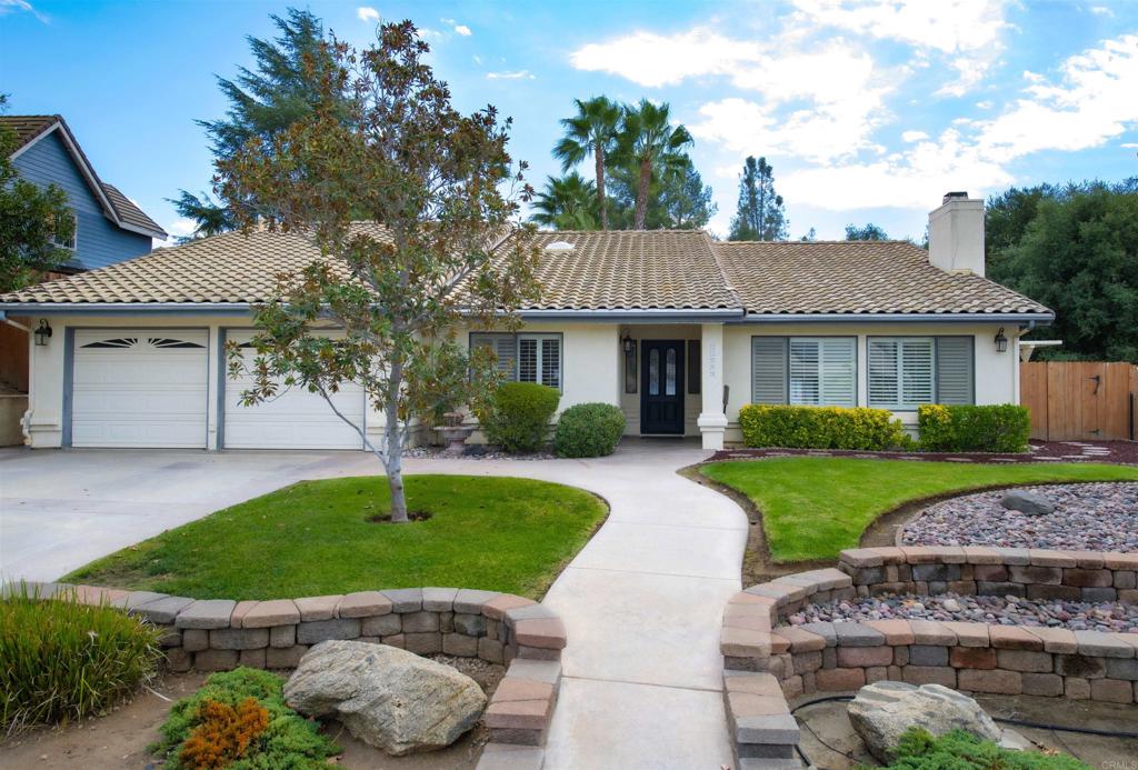 23509 Barona Mesa Road Ramona, CA 92065 - Photo 1 of 34 a house with green field in front of it