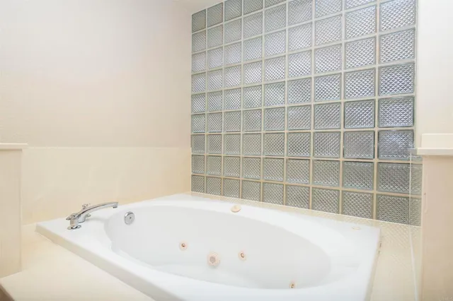 a bathroom with a bathtub