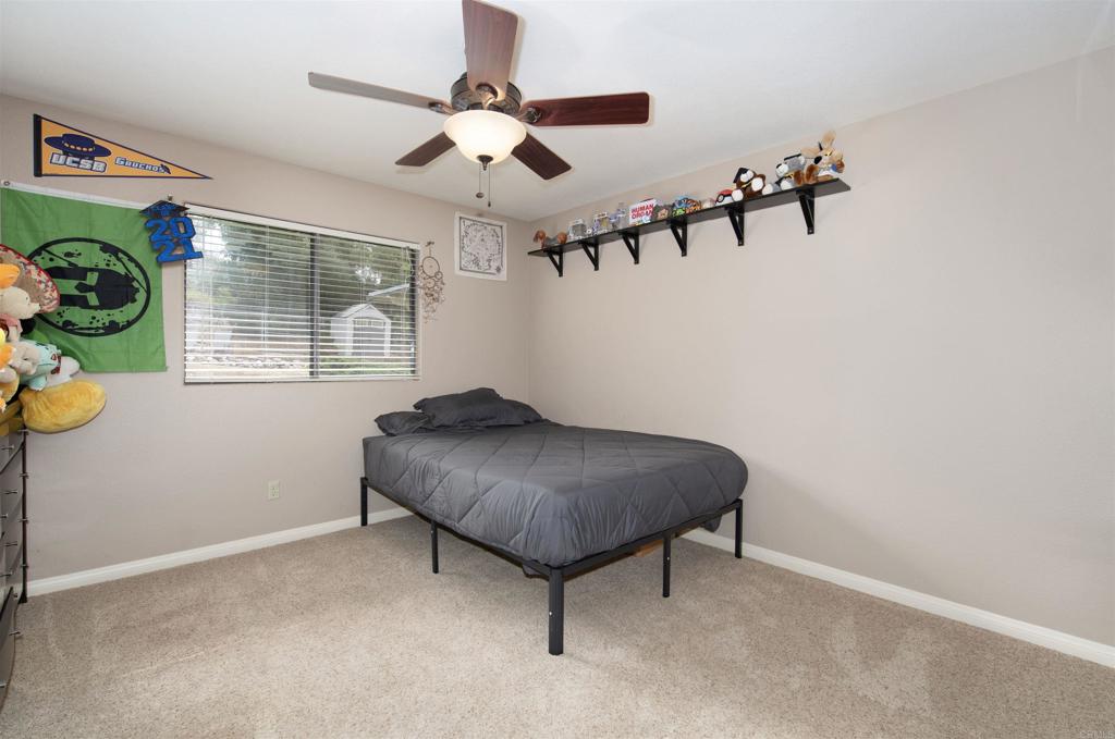 23509 Barona Mesa Road Ramona, CA 92065 - Photo 16 of 34 a living room with furniture and a window