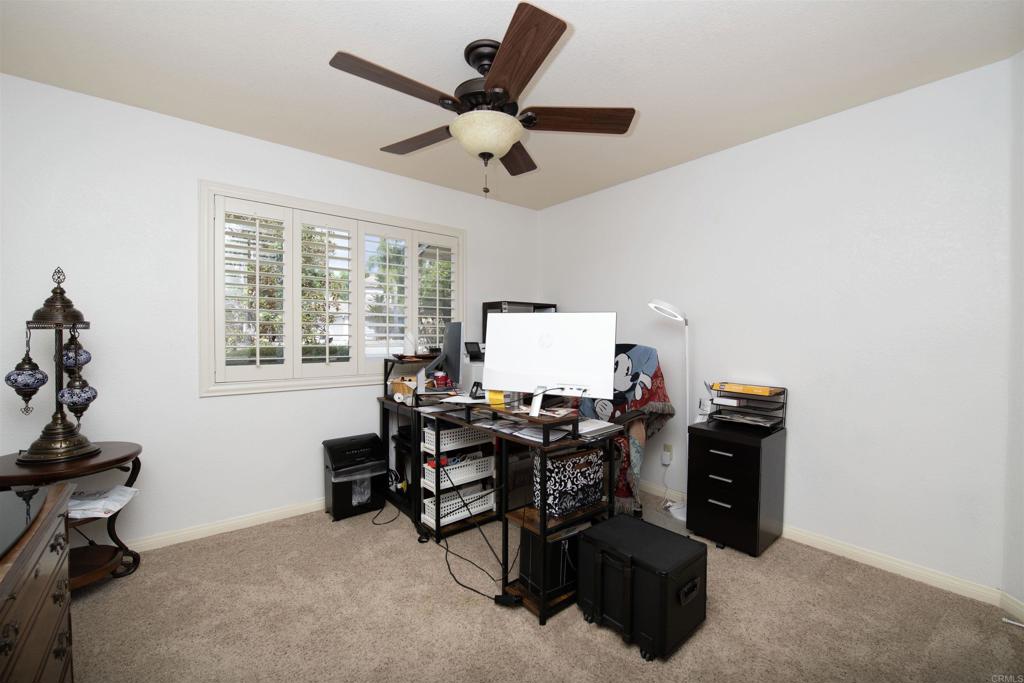 23509 Barona Mesa Road Ramona, CA 92065 - Photo 20 of 34 a view of workspace with furniture and window