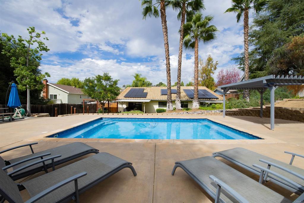 23509 Barona Mesa Road Ramona, CA 92065 - Photo 24 of 34 a view of a swimming pool with sitting area