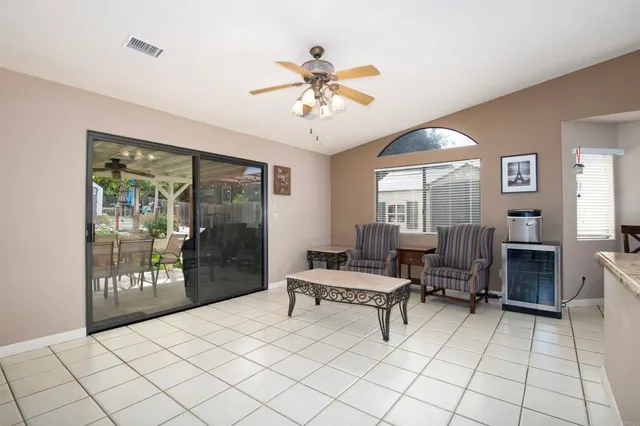 a living room with furniture and a window