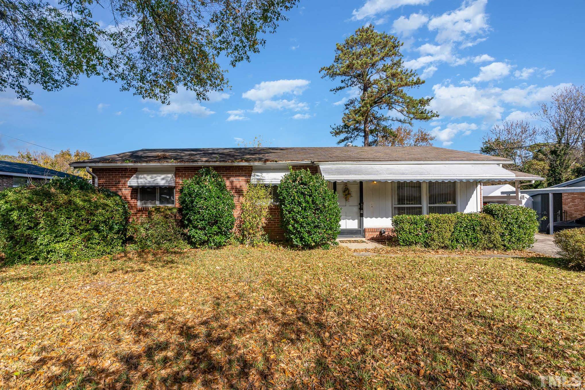 843 Hadley Road Raleigh, NC 27610 - Photo 1 of 28 a view of a house with garden and pathway
