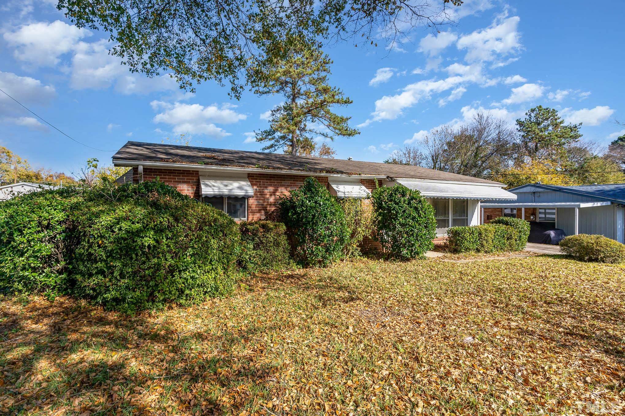 843 Hadley Road Raleigh, NC 27610 - Photo 2 of 28 a view of a house with a small yard