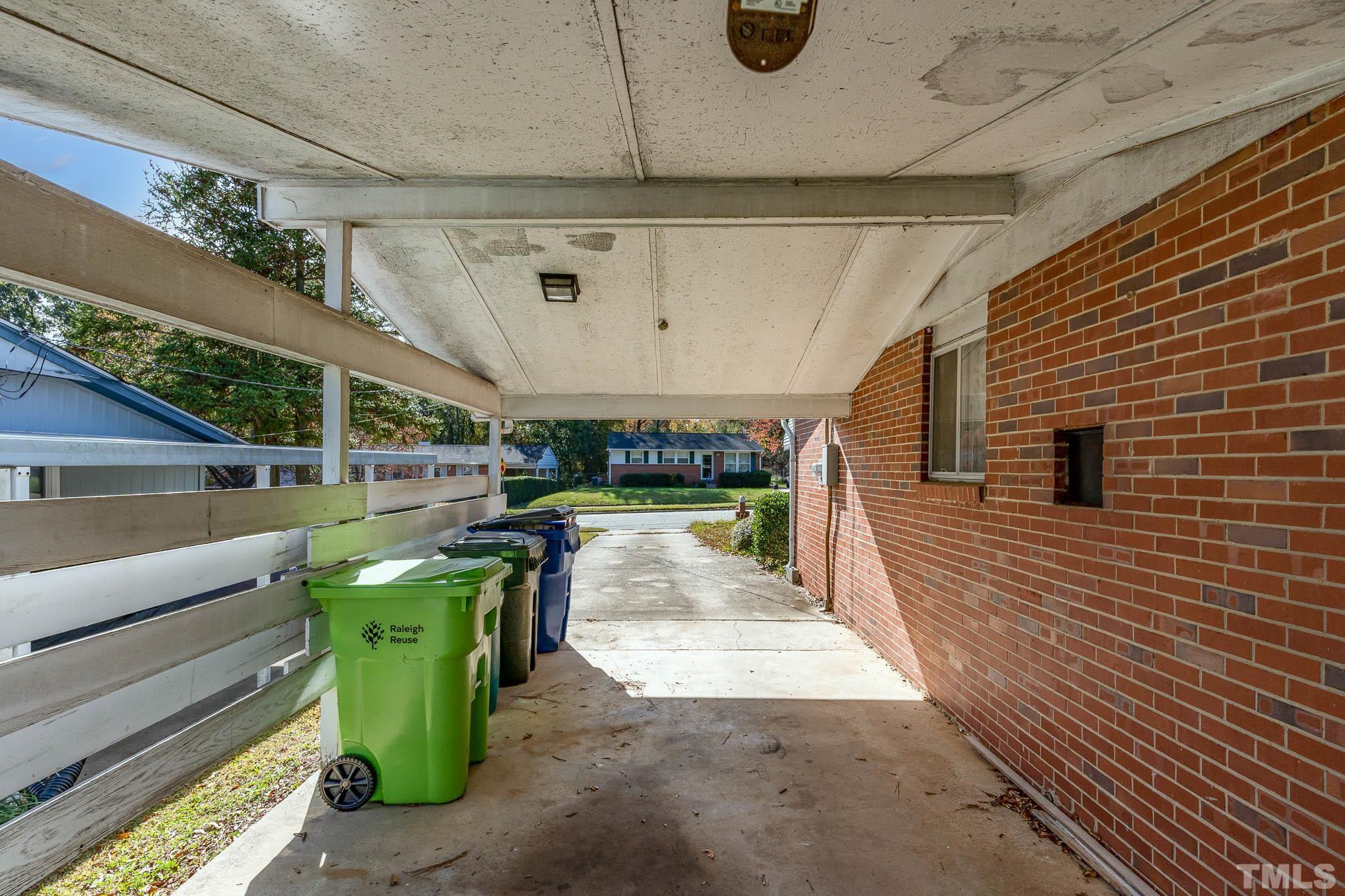 843 Hadley Road Raleigh, NC 27610 - Photo 23 of 28 a view of a porch with furniture
