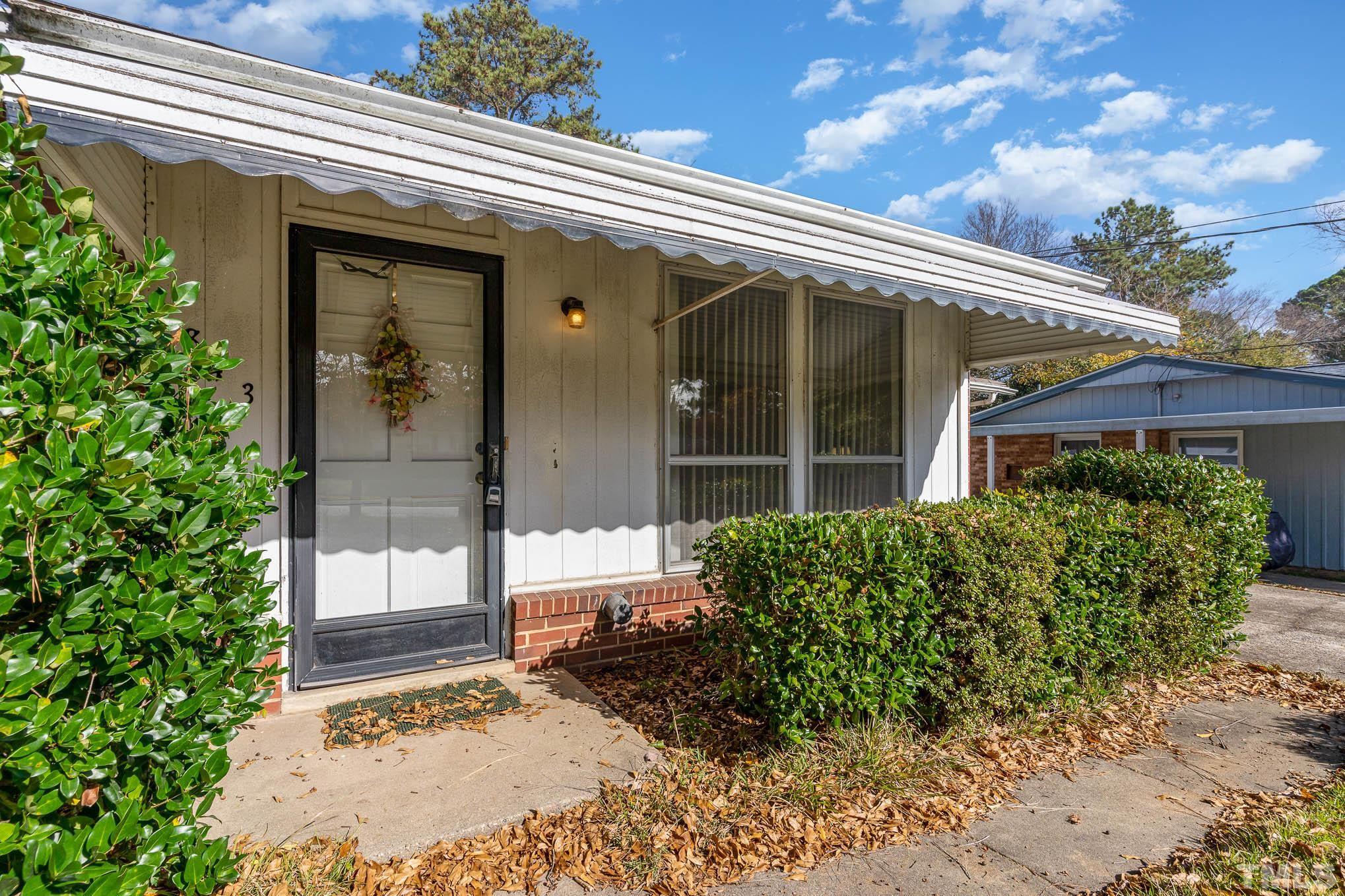 843 Hadley Road Raleigh, NC 27610 - Photo 4 of 28 a front view of a house