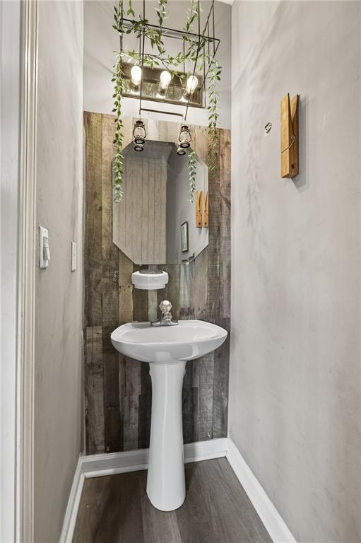 1644 Sandy Beach Point Lawrenceville, GA 30043 - Photo 33 of 60 a bathroom with a sink toilet and shower