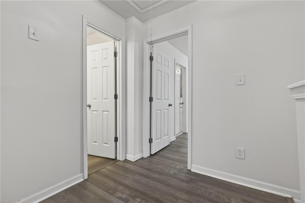 1644 Sandy Beach Point Lawrenceville, GA 30043 - Photo 36 of 60 a view of a hallway with wooden floor
