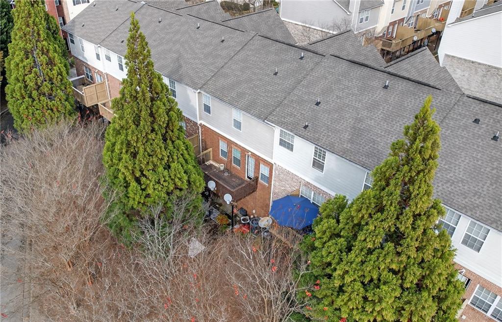 1644 Sandy Beach Point Lawrenceville, GA 30043 - Photo 59 of 60 an aerial view of a house with a yard