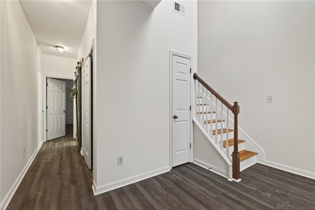 1644 Sandy Beach Point Lawrenceville, GA 30043 - Photo 6 of 60 a view of entryway with wooden floor