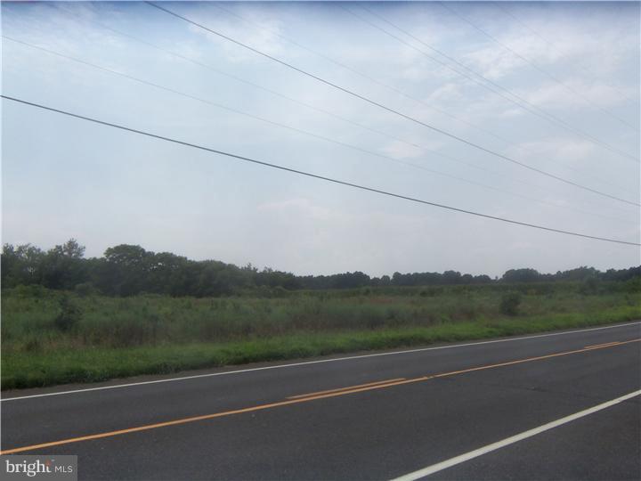 776 Elk Road Monroeville, NJ 08343 - Photo 3 of 5 a view of a field of grass and trees
